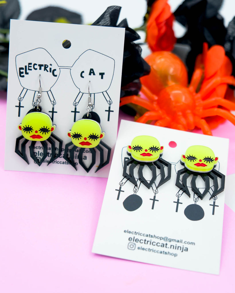 Glow in the dark acrylic spider baby earrings by electric cat