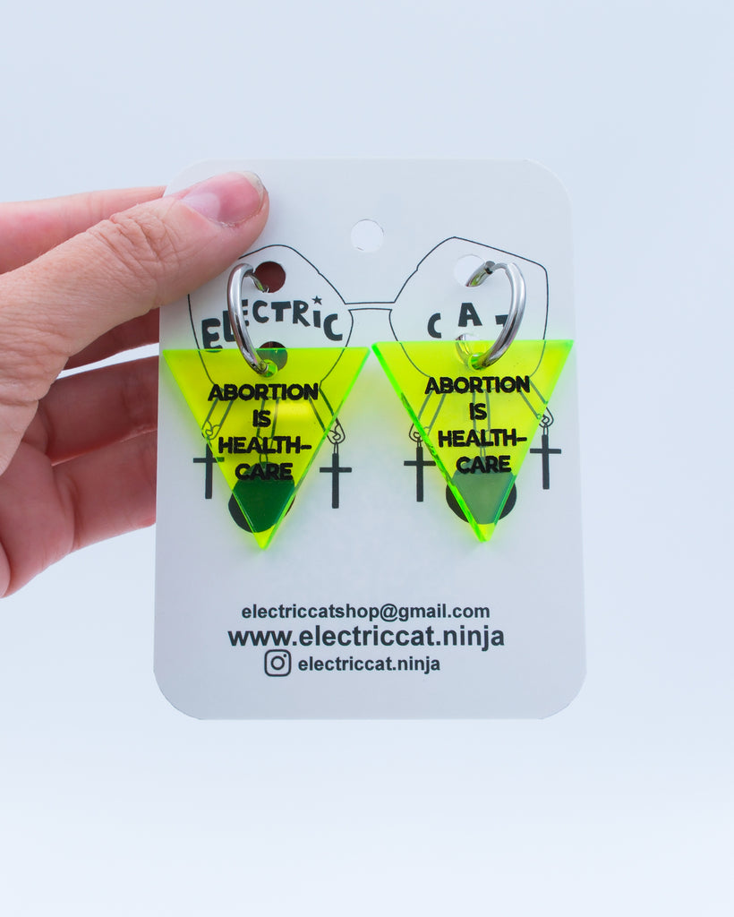 Neon green abortion is healthcare earrings by Electric Cat