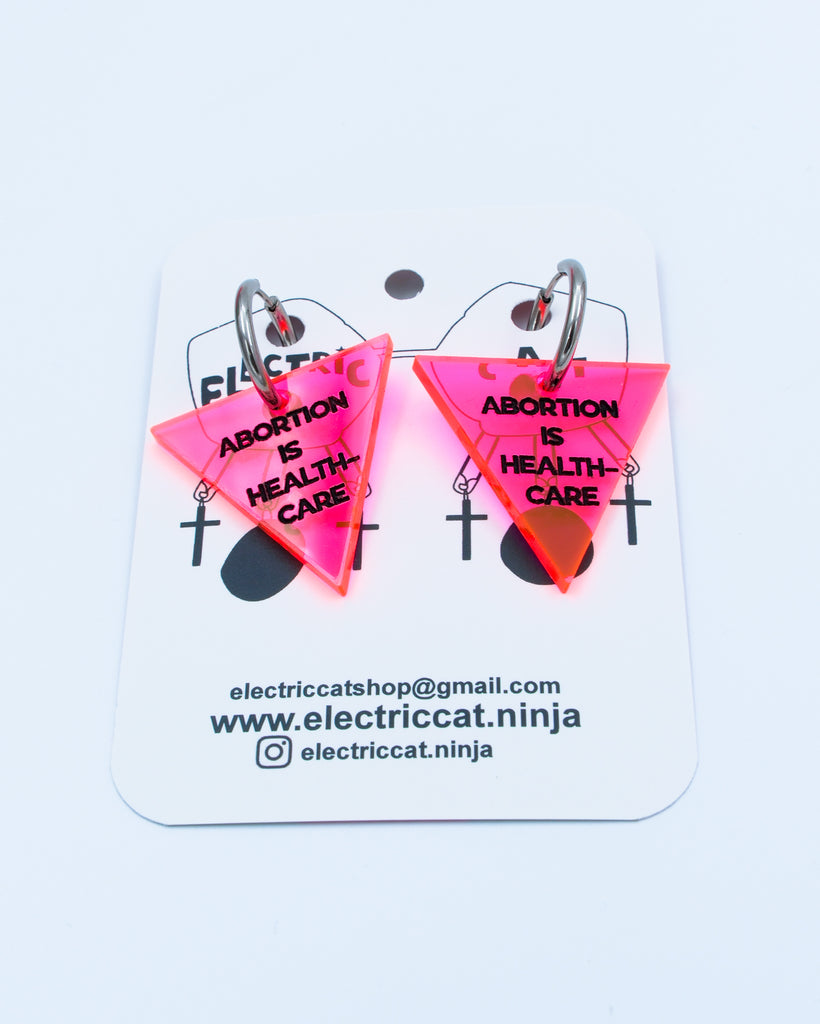 Neon Pink abortion is healthcare earrings by Electric Cat