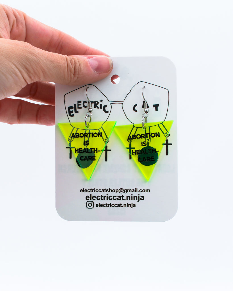 Neon green abortion is healthcare earrings by Electric Cat