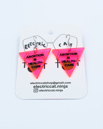 Neon Pink abortion is healthcare earrings by Electric Cat