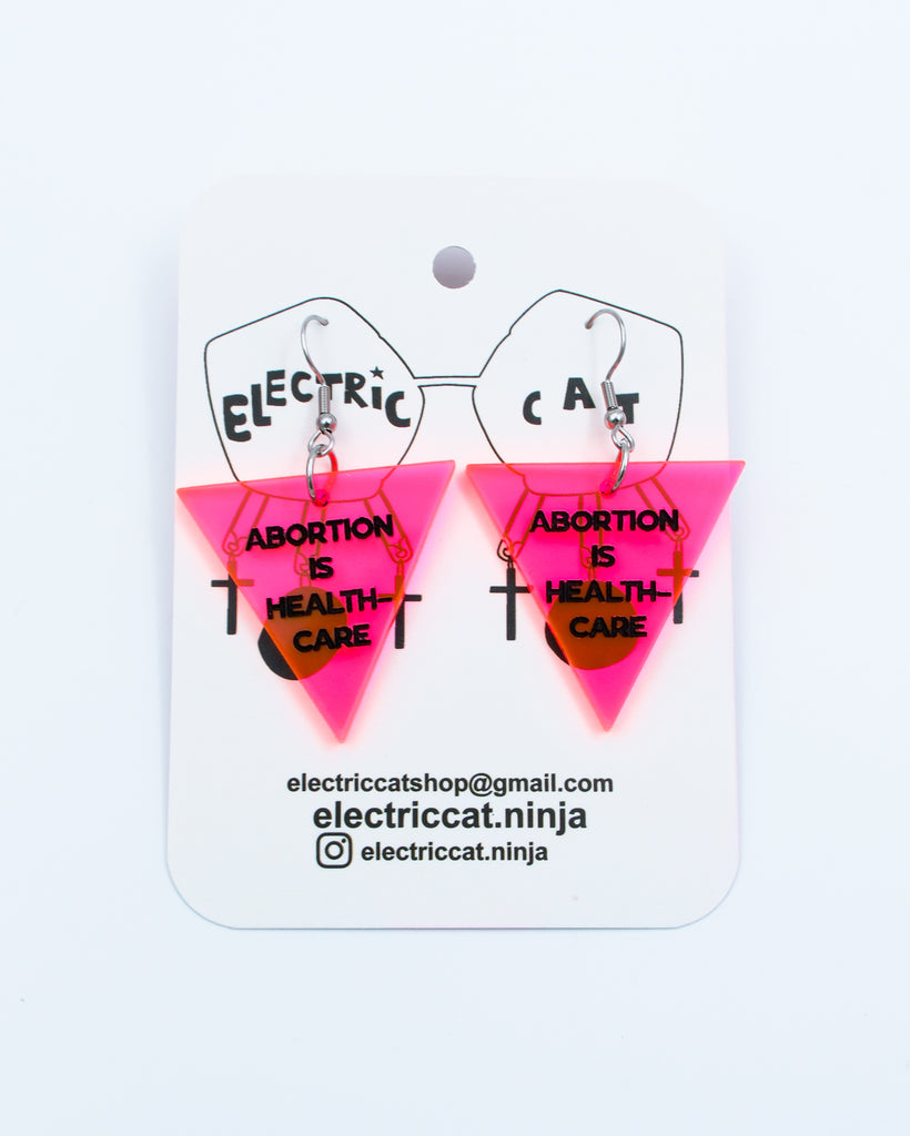 Neon Pink abortion is healthcare earrings by Electric Cat