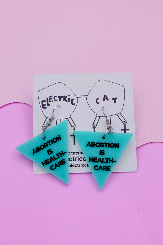 Abortion is healthcare acrylic earrings by electric cat.