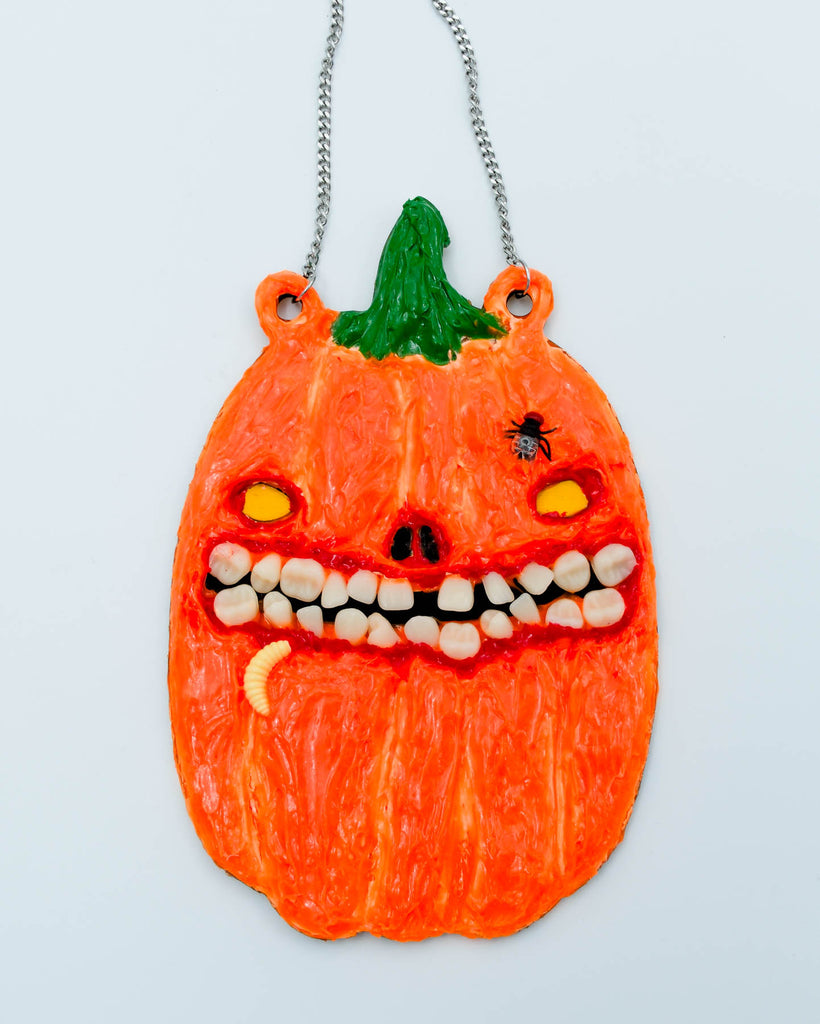 Handmade creepy pumpkin face with resin teeth, acrylic texture, and tiny maggot accent, wall art by Electric Cat.