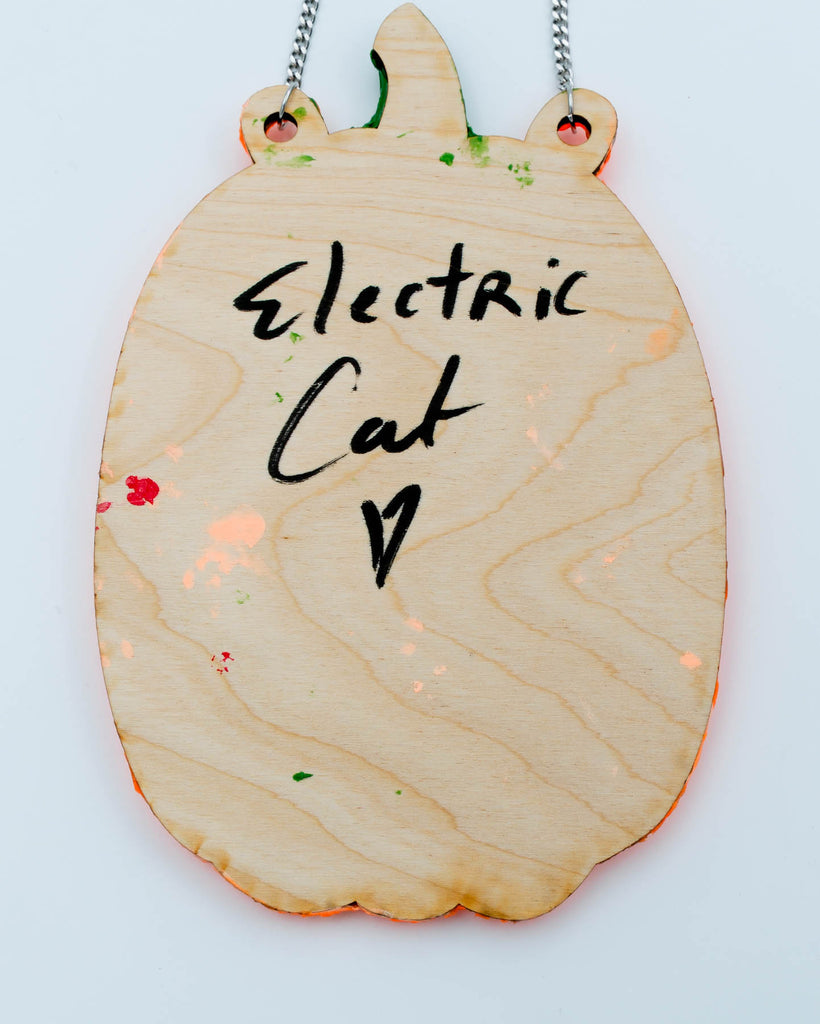 Handmade creepy pumpkin face with resin teeth, acrylic texture, and tiny maggot accent, wall art by Electric Cat.