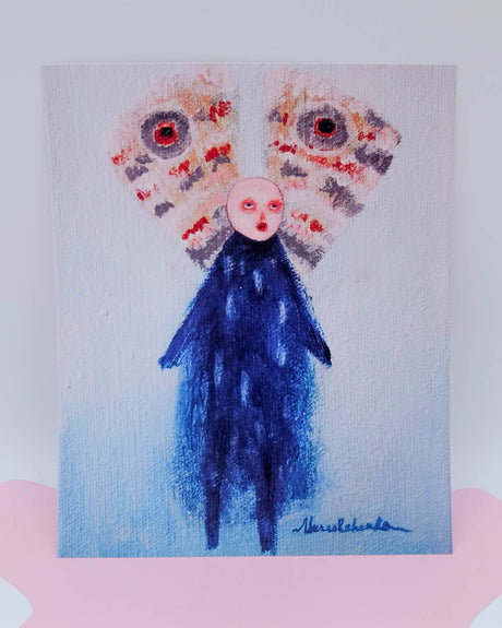 An art print featuring a stylized moth with blue body and pink wings on a white background, signed by the artist.