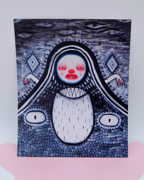 An art print featuring a stylized, monochrome depiction of a female figure with exaggerated features and a fantastical/supernatural theme.