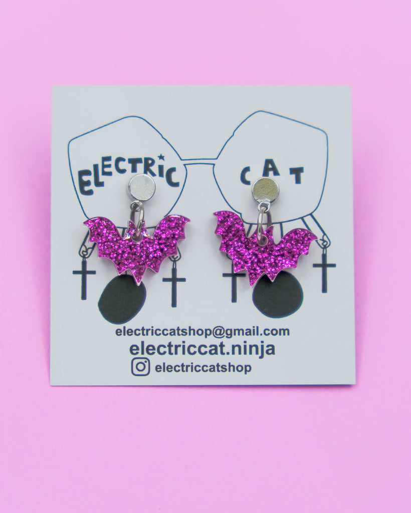 Purple glitter acrylic bat post earrings by electric cat