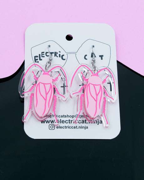 Pink cockroach acrylic statement earrings by electric cat