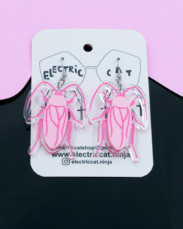 Pink cockroach acrylic statement earrings by electric cat