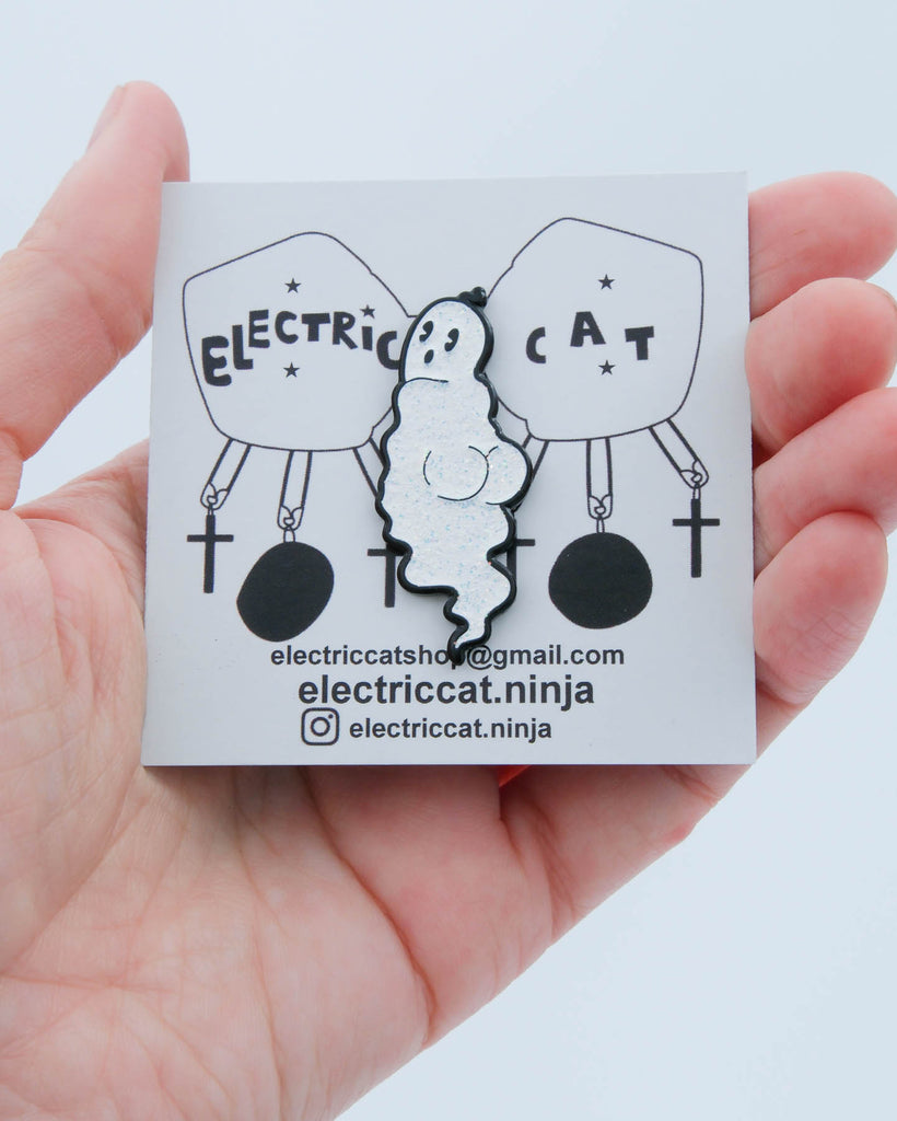 White glitter enamel ghost pin with black outline shown on branded Electric Cat card.