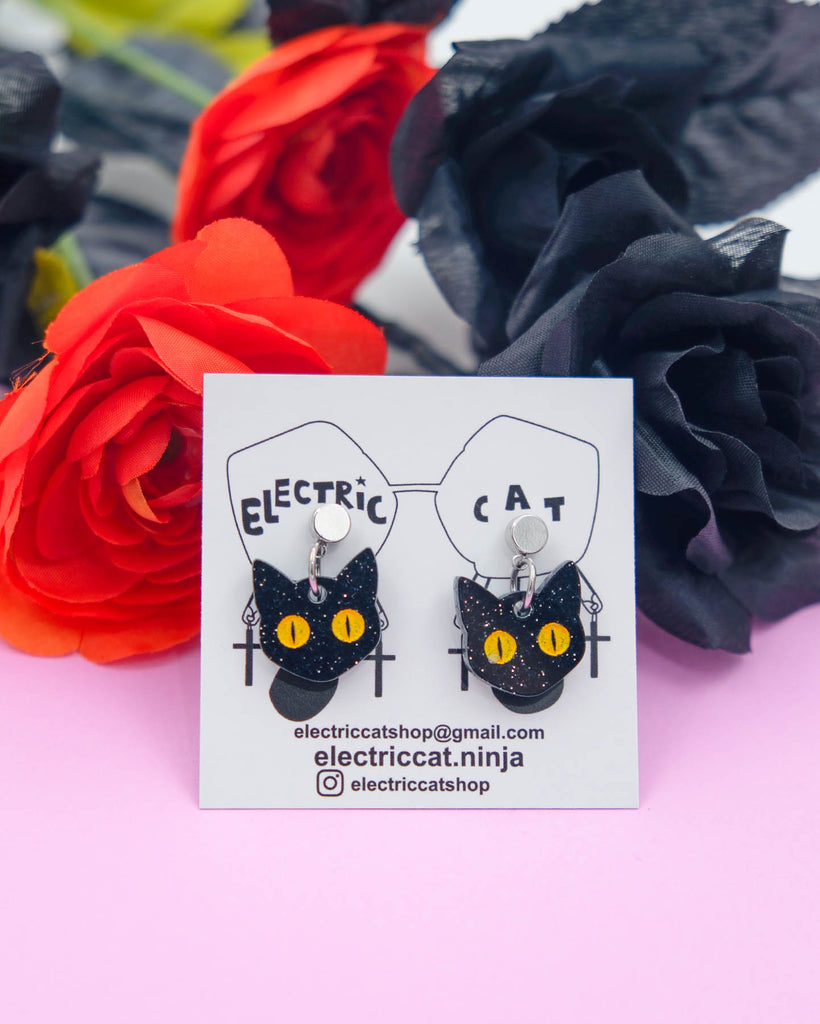 Black cat acrylic earrings by electric cat