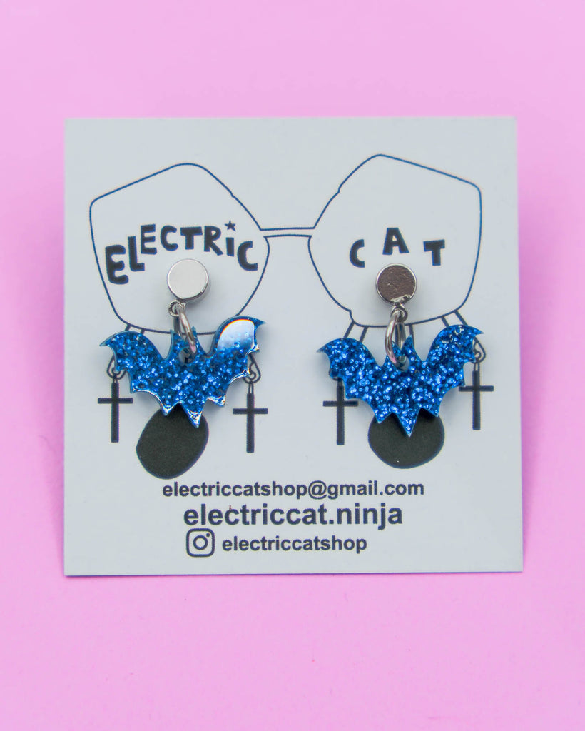 Blue glitter acrylic bat post earrings by electric cat