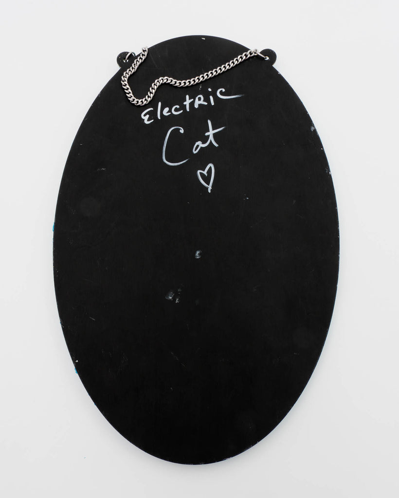 black wood back of the surreal handmade mirror with textured faux frosting, two glitter eyes, flies, and maggots on blue and yellow frame, art by Electric Cat.