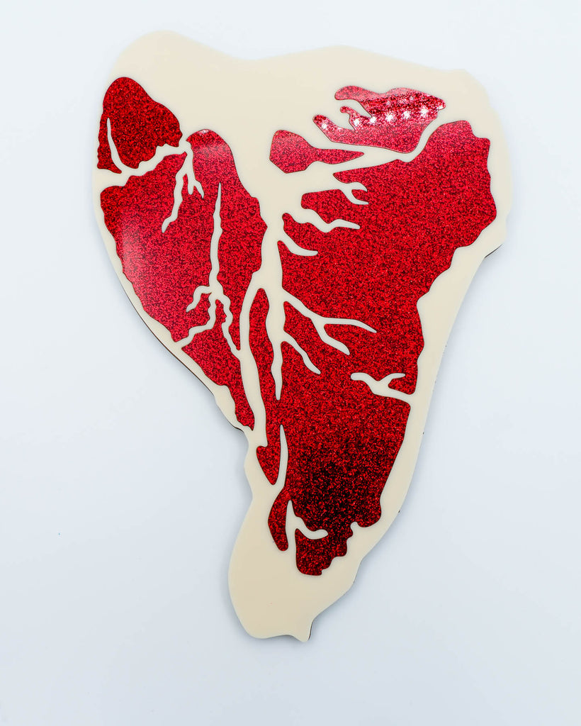 Pop art style steak sculpture made with red glitter acrylic and ivory details, handmade wall decor by Electric Cat.