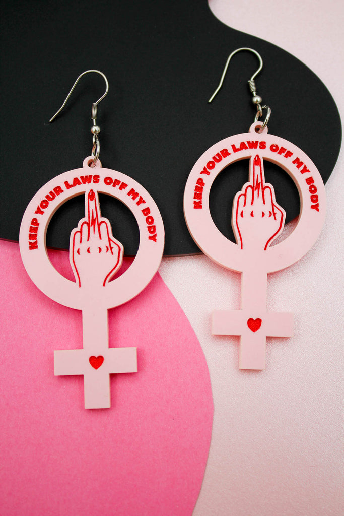 keep your laws off my body middle finger woman symbol acrylic earrings by electric cat