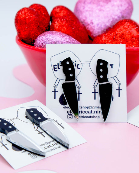 acrylic knife studs earrings by electric cat
