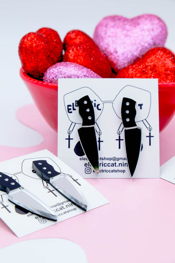acrylic knife studs earrings by electric cat