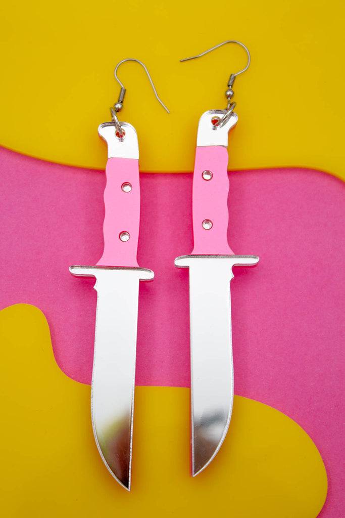 Pink acrylic knife earrings by electric cat