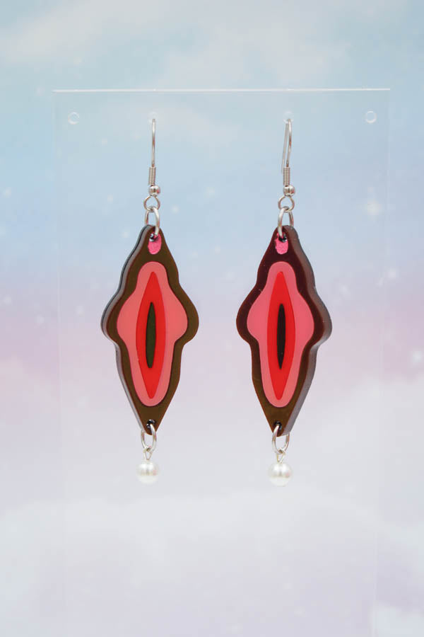 Brown acrylic vagina earrings with a pearl
